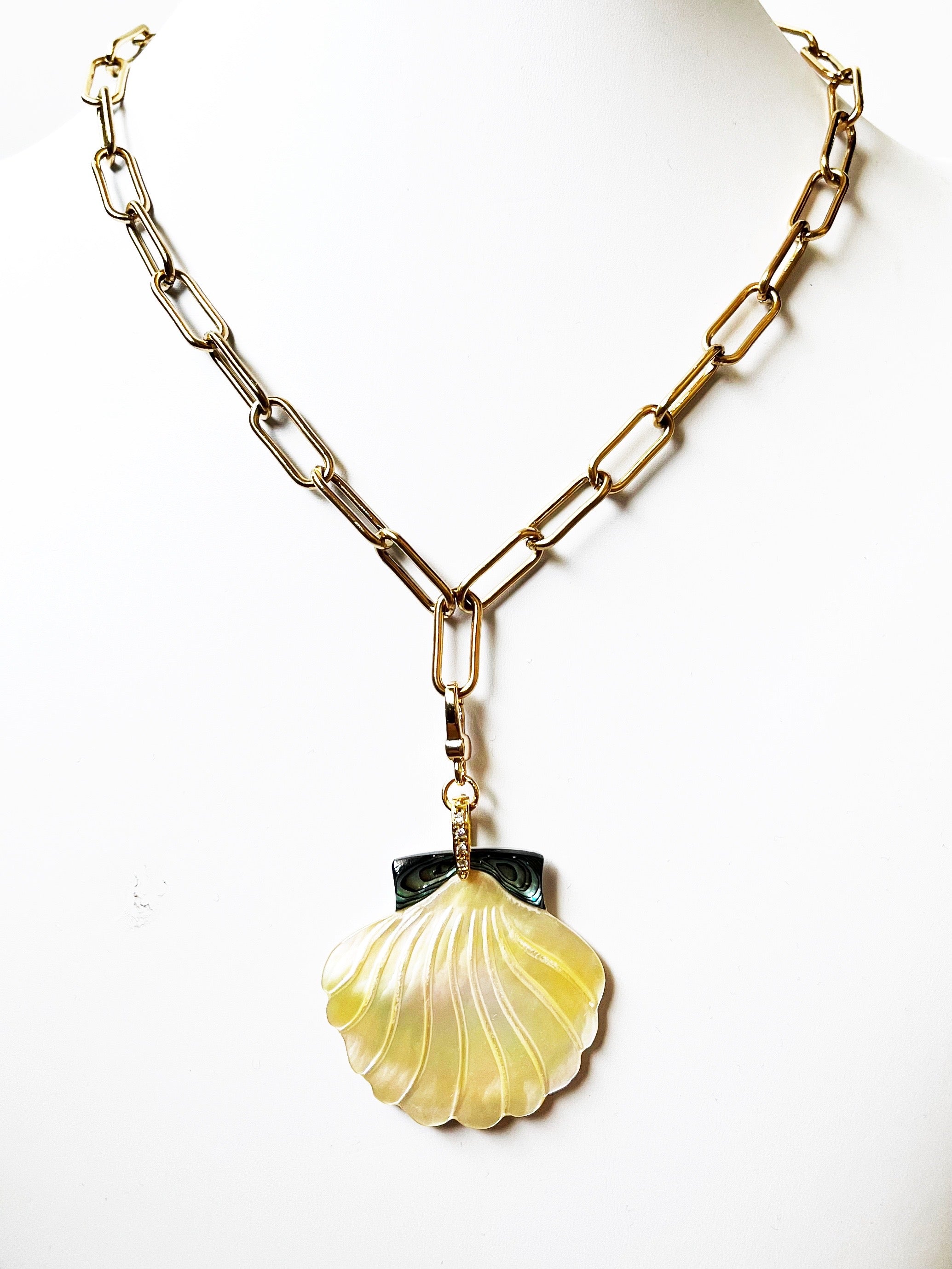 gold chain with shell pendant
