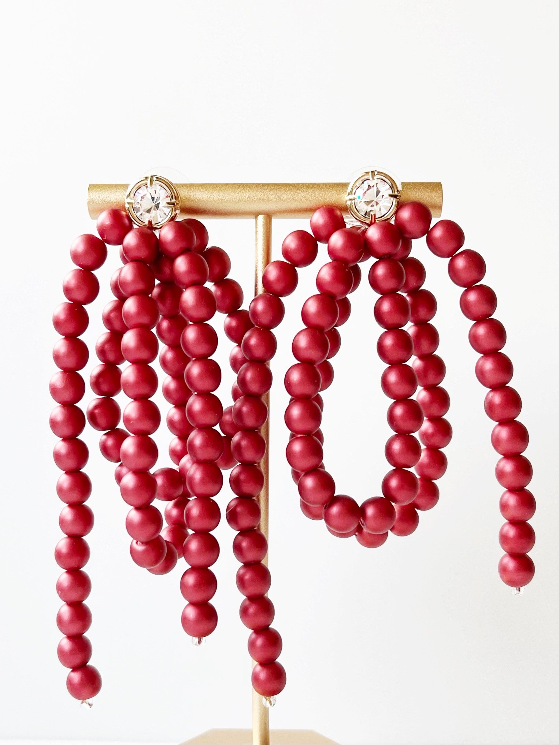 red pearl bow earrings