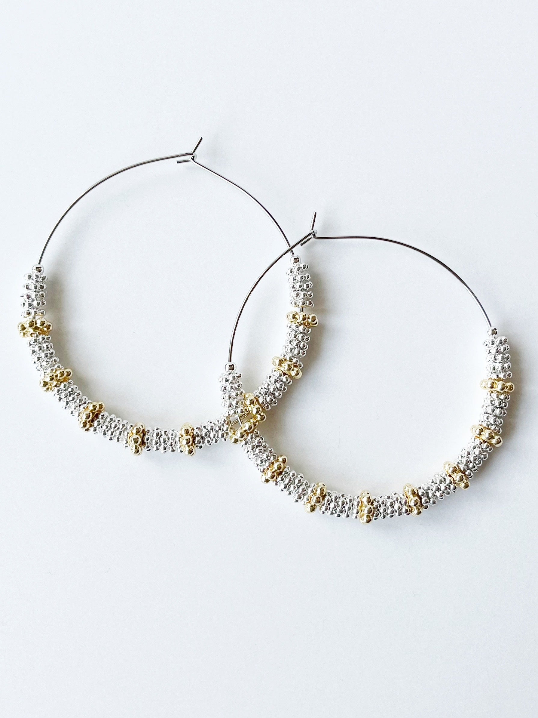 silver beaded hoop earrings with gold accents