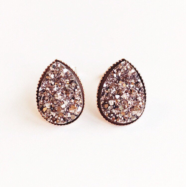 Rose gold teardrop resin druzy stone stud earrings set in a rose gold color setting. 