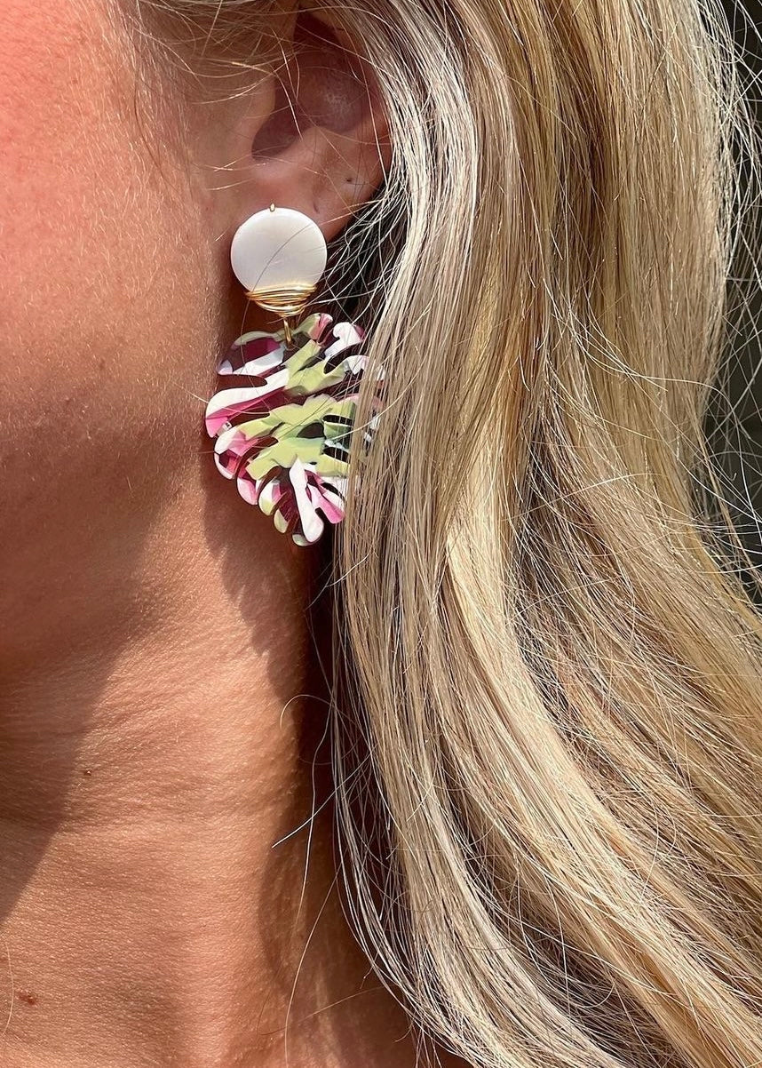 dangle earrings on woman