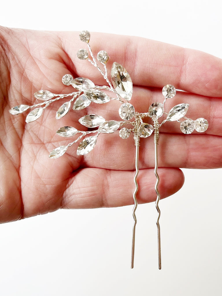 crystal bridal hairpiece on hand