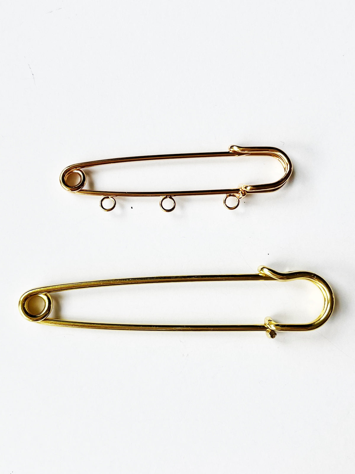 gold pin brooch