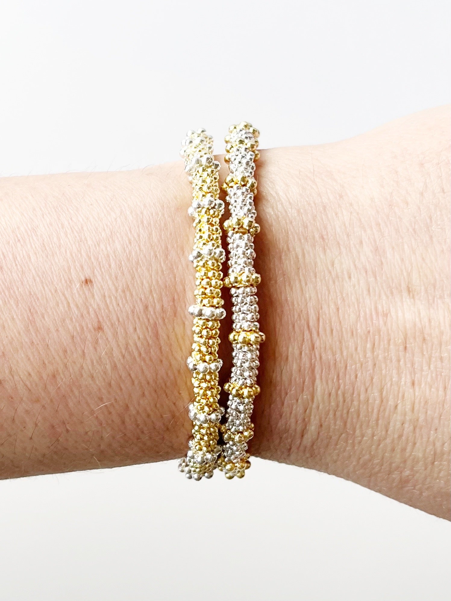 gold and silver stacking bracelets