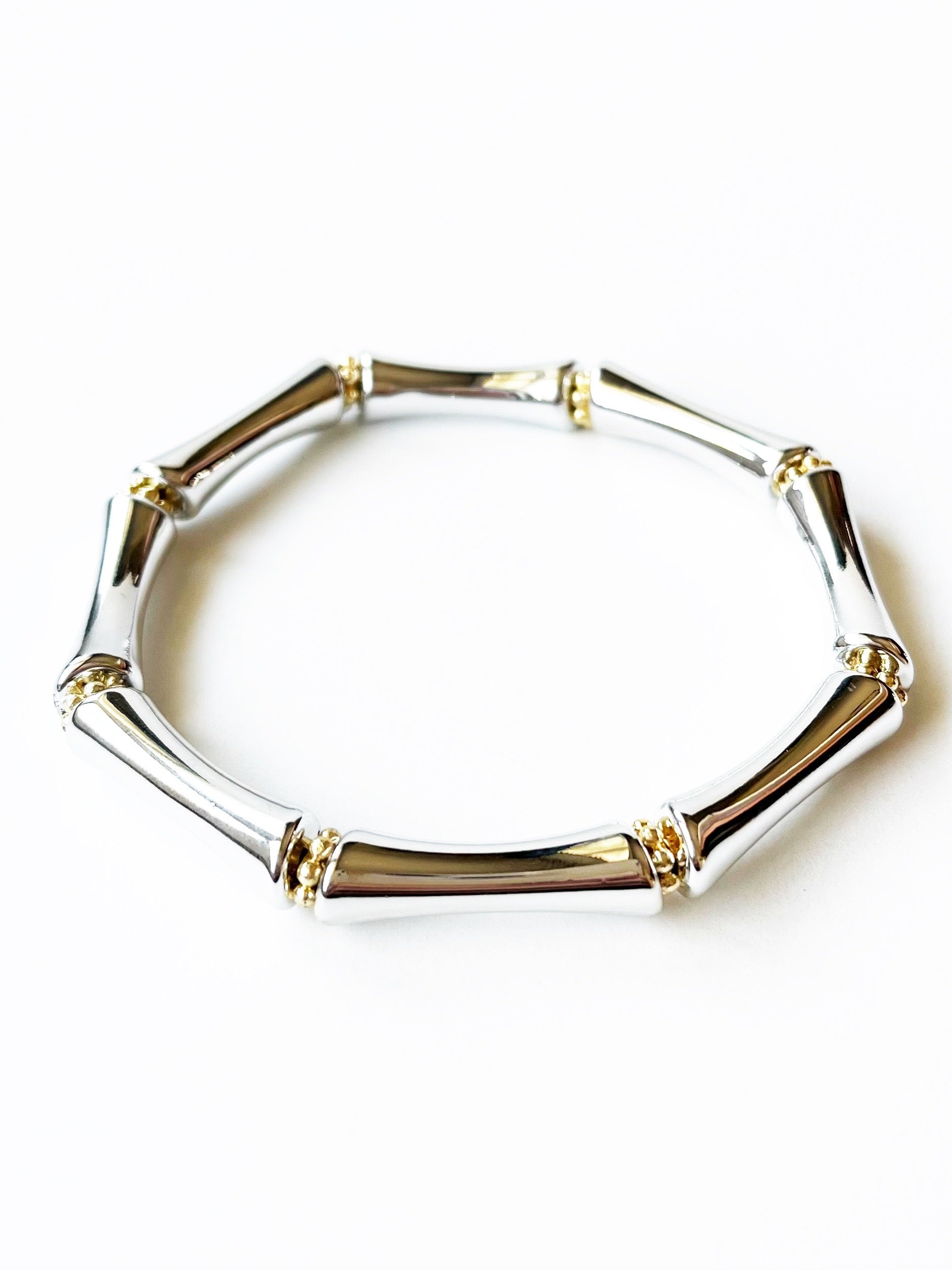 silver bamboo bangle bracelet with gold accents