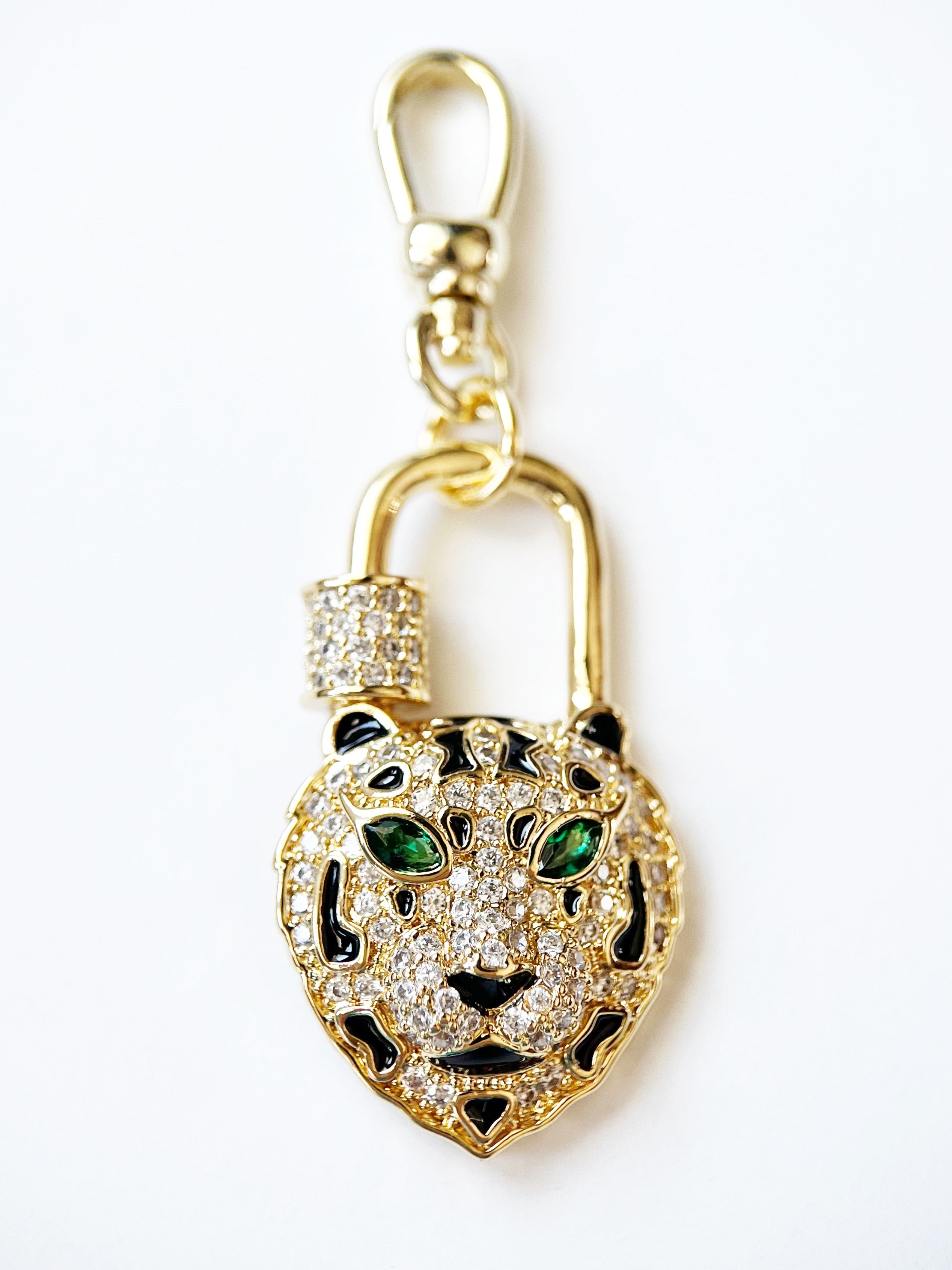 tiger charm with black enamel and green crystal eyes
