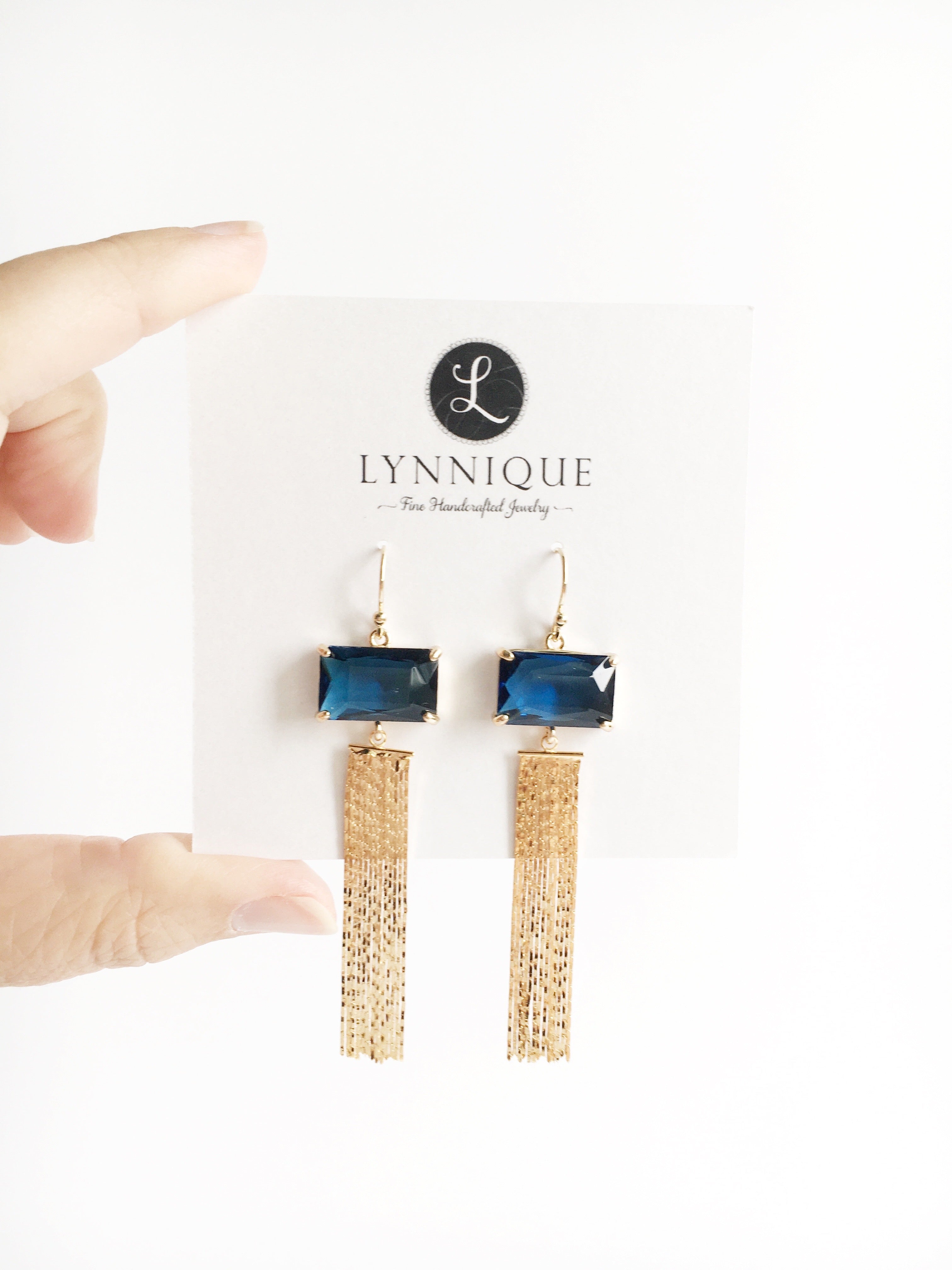 Sapphire Navy Blue and Gold Tassel Dangle Earrings on display car