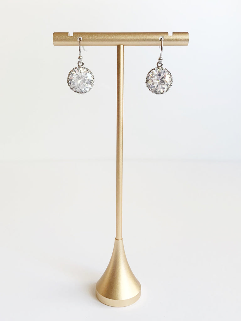 silver crystal drop earrings on gold earring t stand