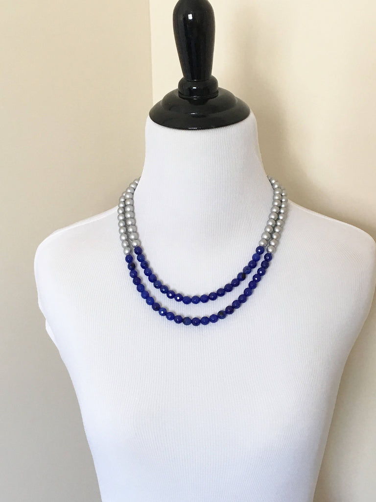 Mannequin wearing Two strand blue quartz and silver wooden beaded necklace with adjustable chain.