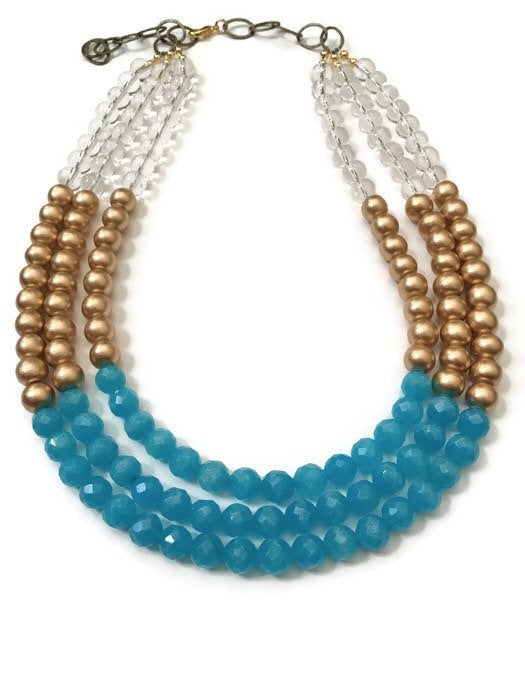 Three strand teal jade, clear quartz, and gold wooden bead statement necklace