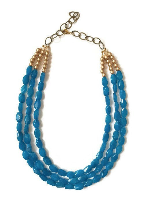Three strand turquoise quartz and gold wooden beaded necklace. 