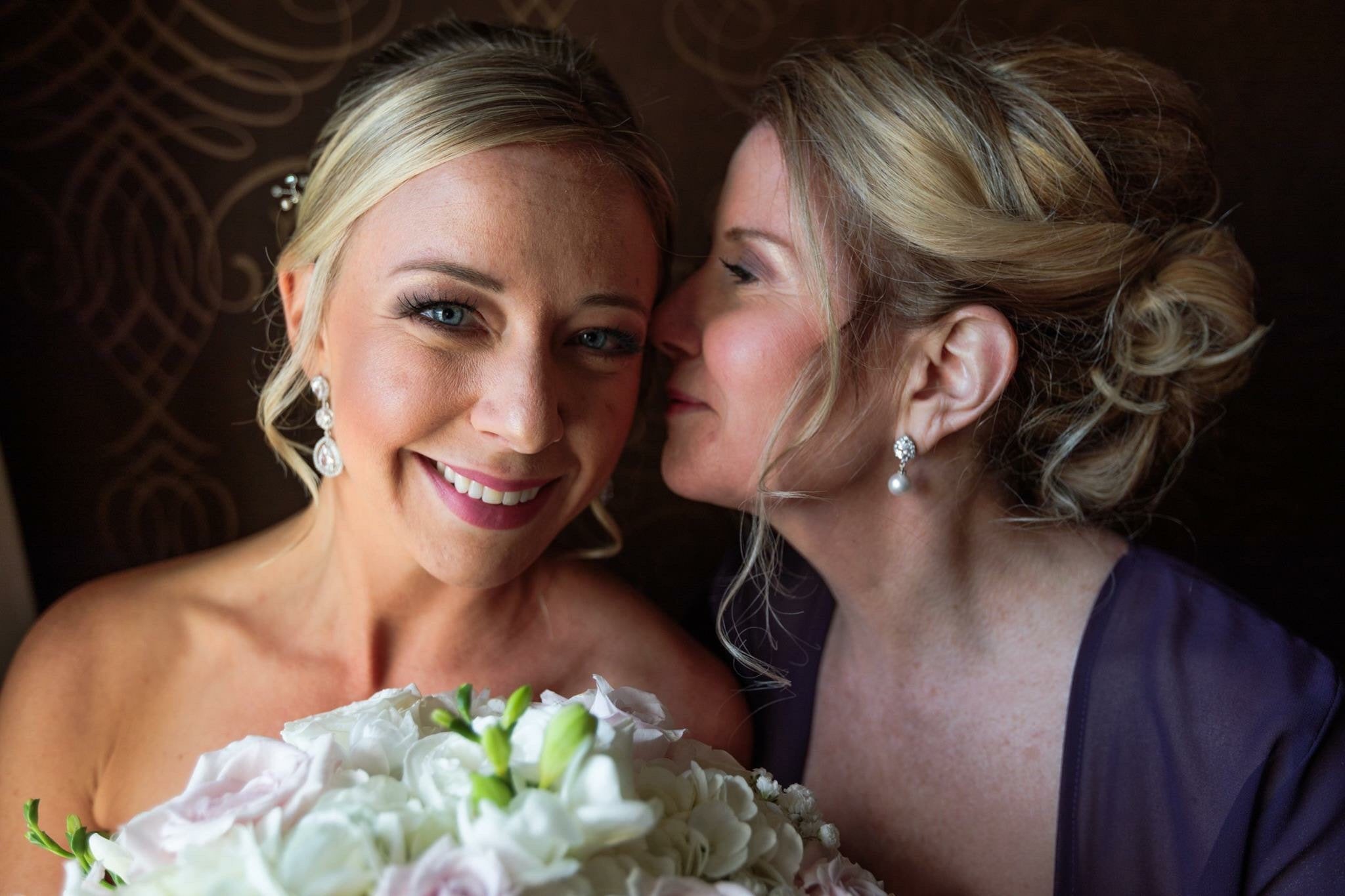 Bride and her mom wearing White Pearl and Crystal cubic zirconia Drop stud Earrings 