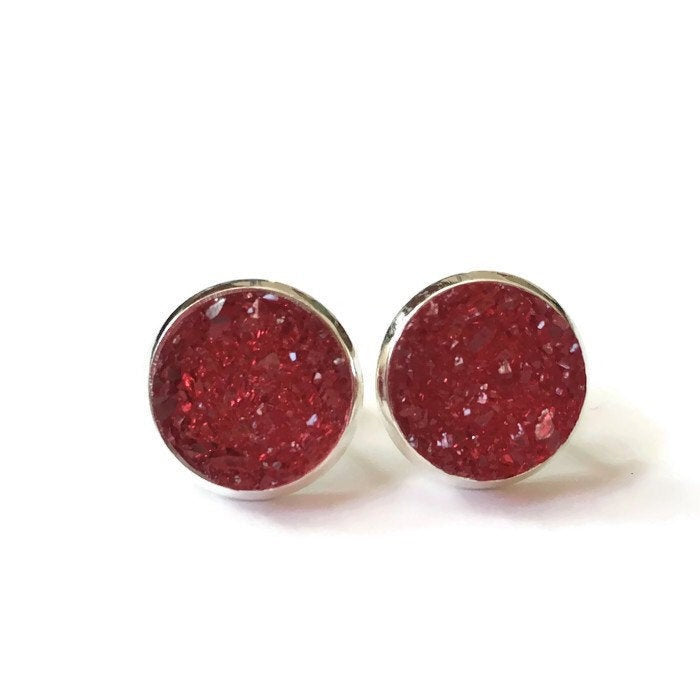 Red resin druzy stone stud earring set in a silver color setting 