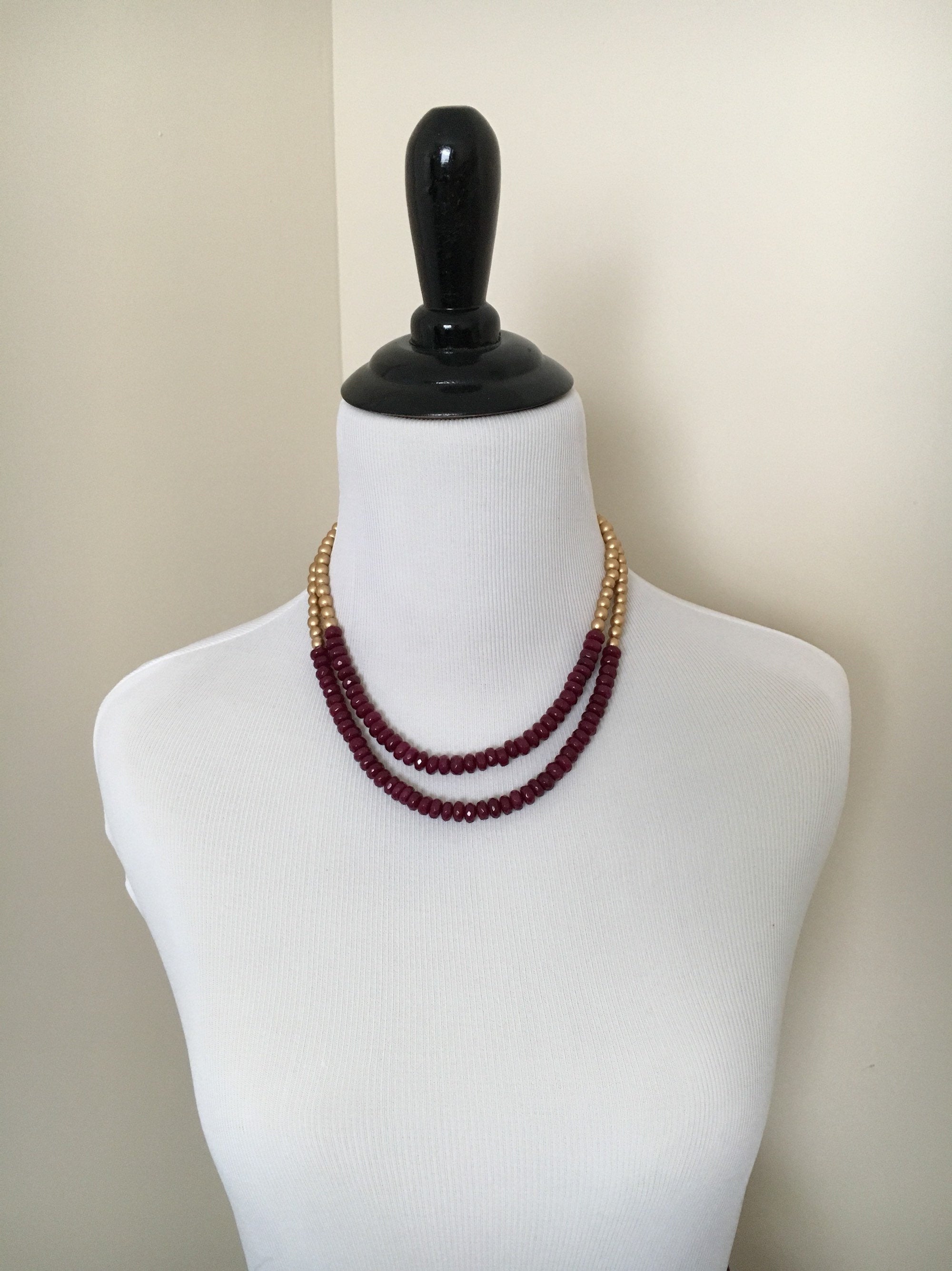 Mannequin wearing Two Stranded Pink and Gold Statement Necklace