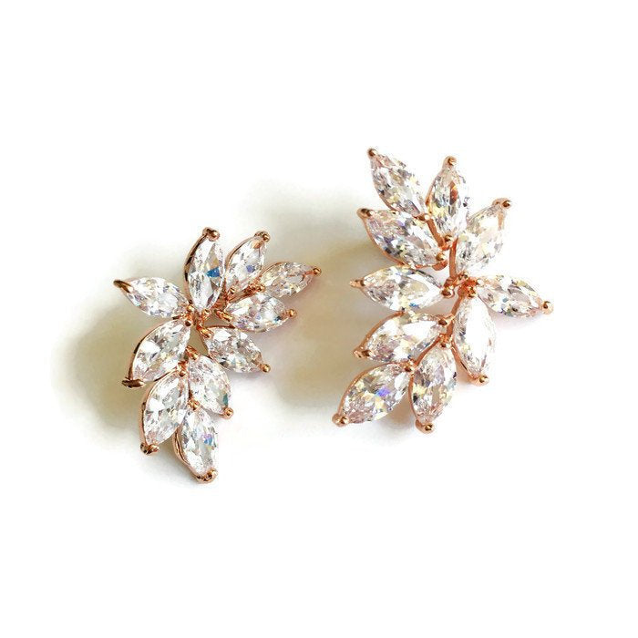 Cubic zirconia crystals in a rose gold plated brass setting earring