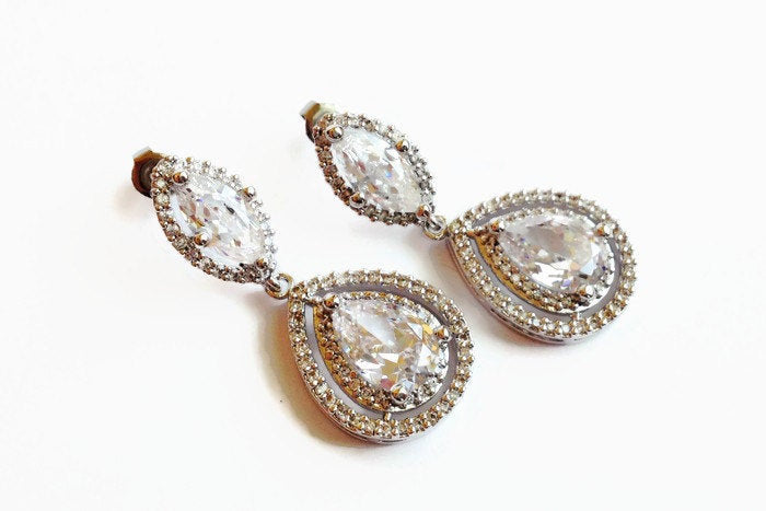 Marquise and Teardrop cubic zirconia Crystal Earrings in a silver colored rhodium plated brass setting.
