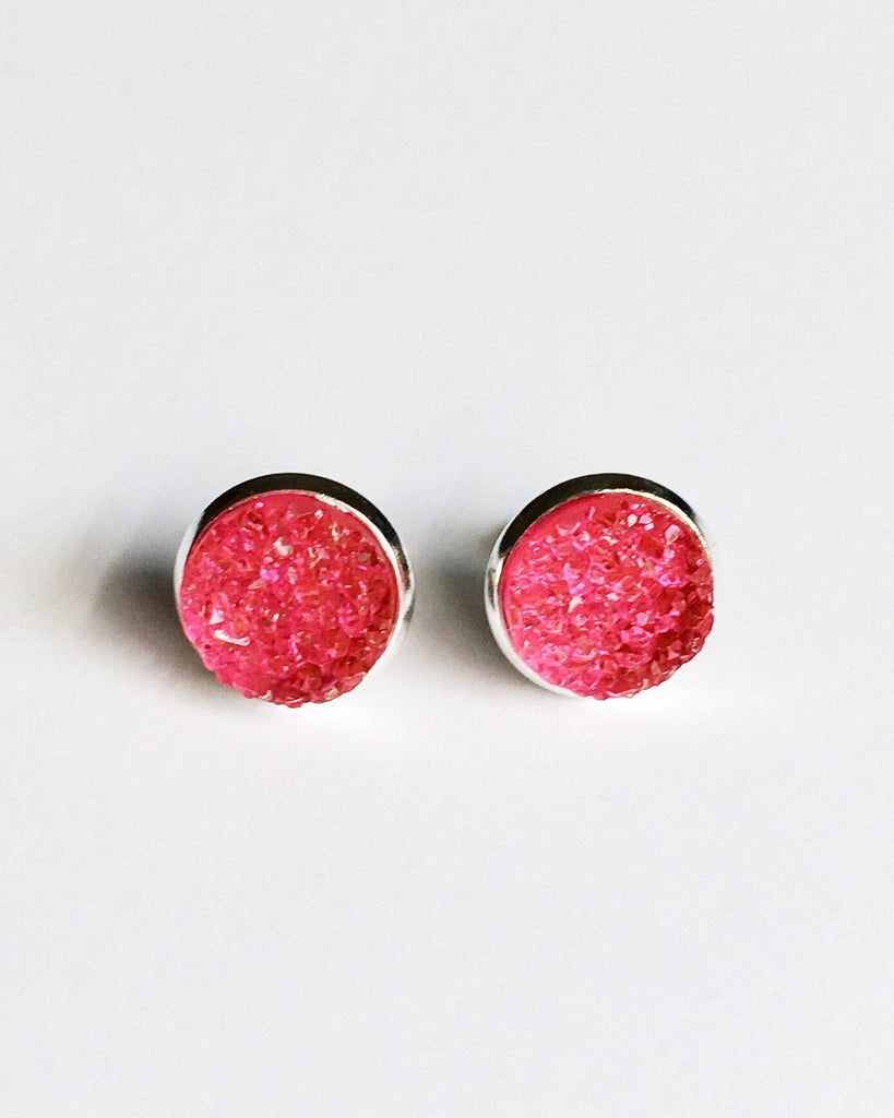 Flamingo Pink Druzy stone Stud Earrings in a silver setting.