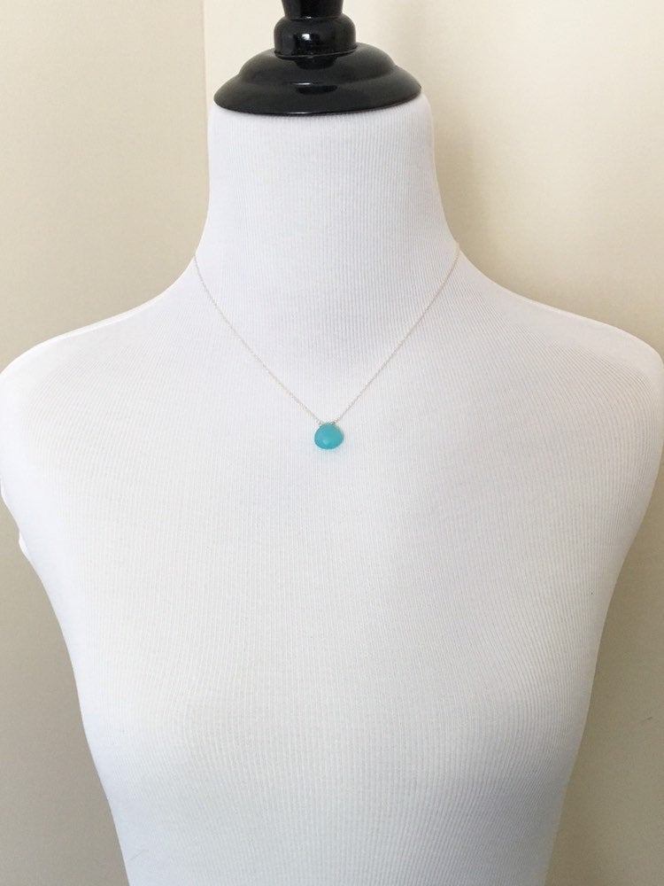 Mannequin wearing Aqua Chalcedony Teardrop Pendant Necklace with Sterling Silver Chain - front view.