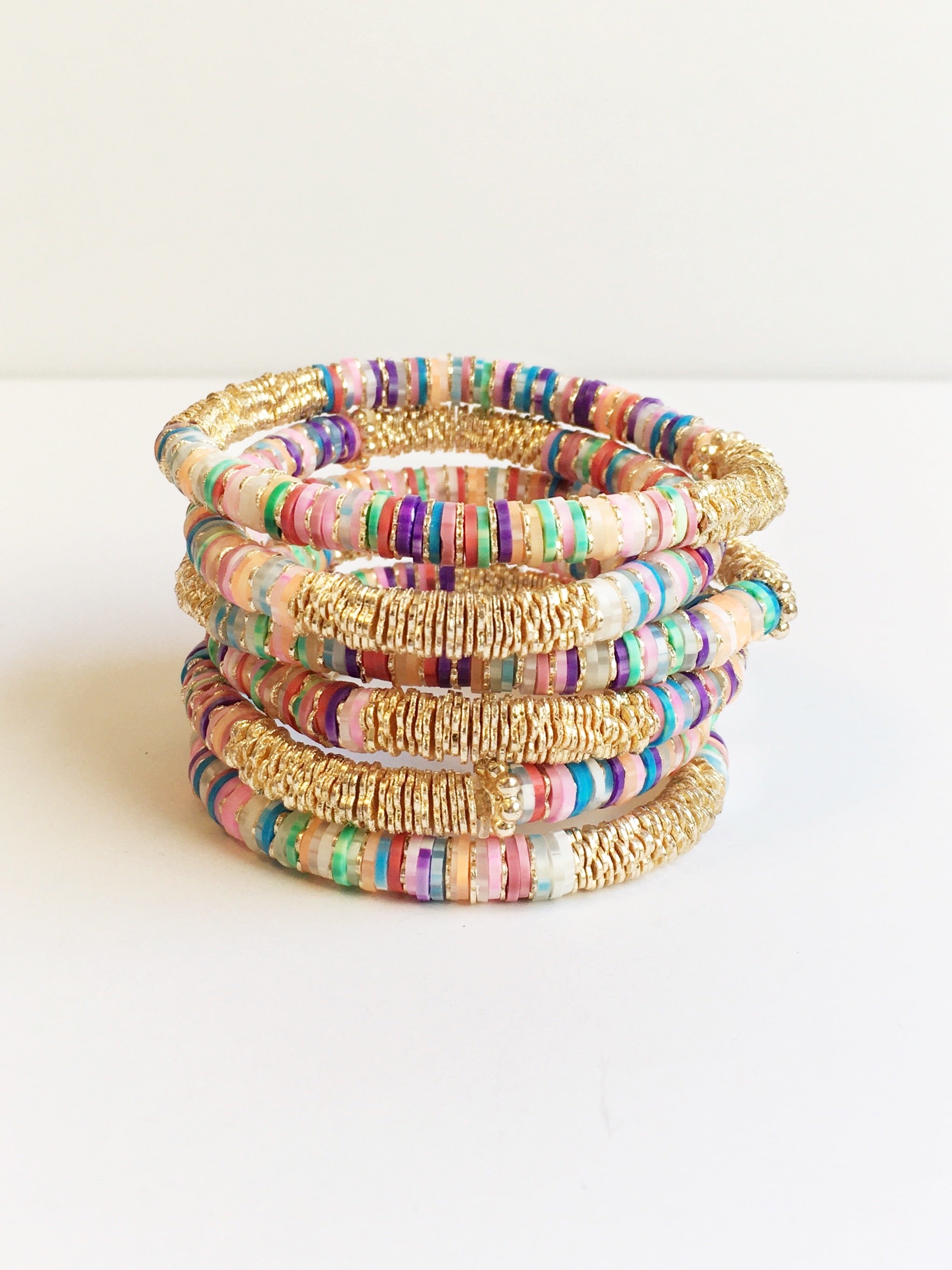 Stack of Tie Dye Confetti and Gold Beaded Bracelets