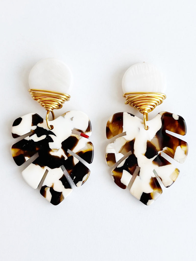 brown and white palm leaf earrings
