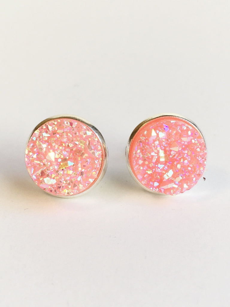 Sparkle peach resin druzy stone stud earrings set in a silver color setting.