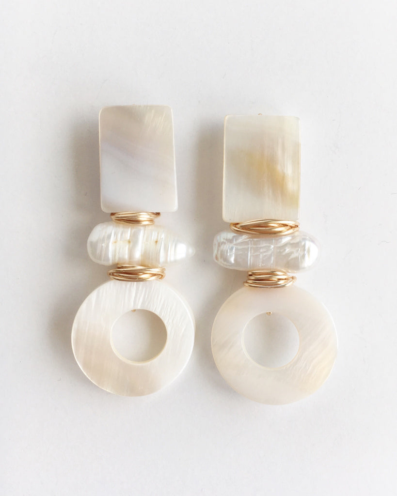 Genuine mother of pearl and pearl stones wire wrapped with gold plated wire earrings.