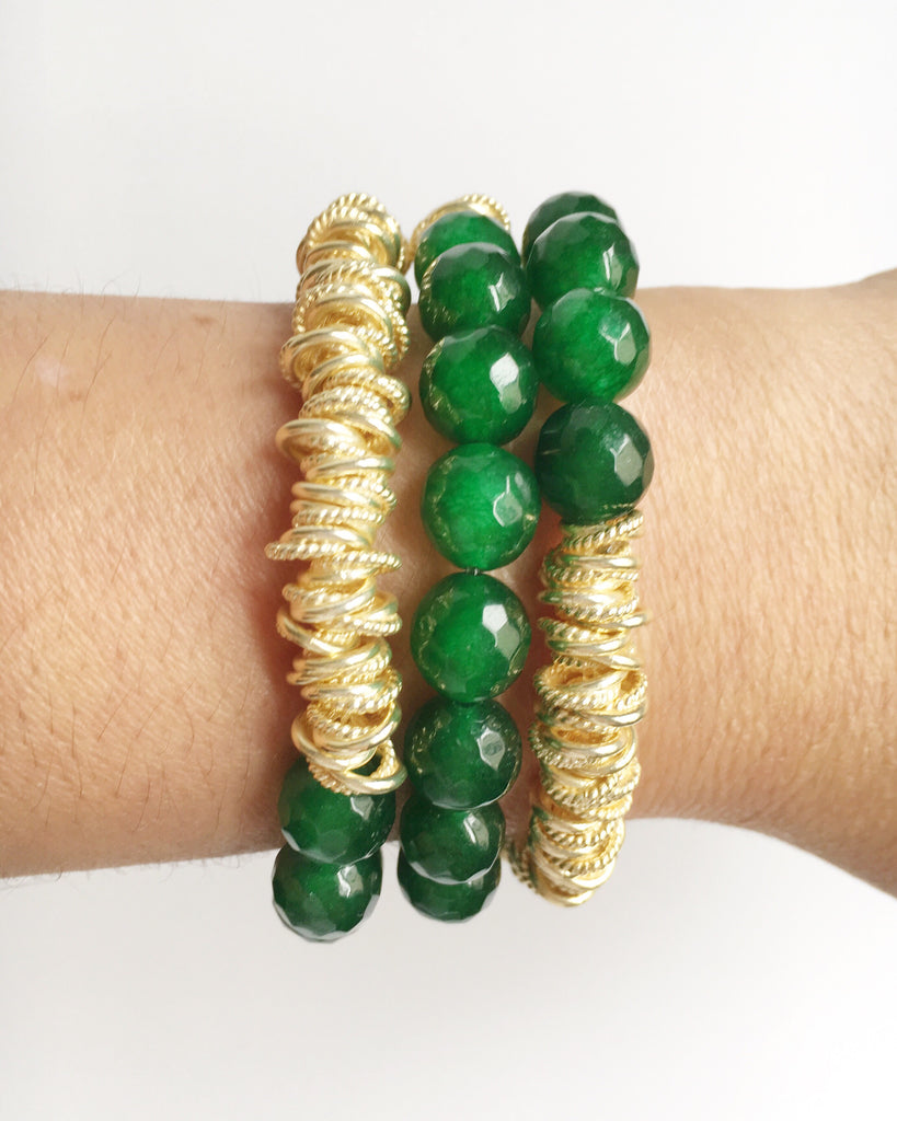 Women's wrist wearing three Green Agate and Gold Stacking Beaded stretch Bracelets