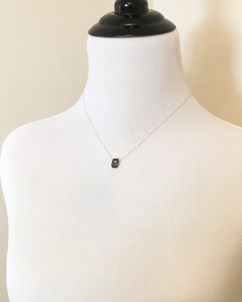 Mannequin wearing Gray Silver Night Crystal and Sterling Silver Pendant Necklace on sterling silver chain.