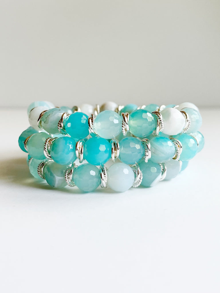 aqua and silver bead bracelets stacked