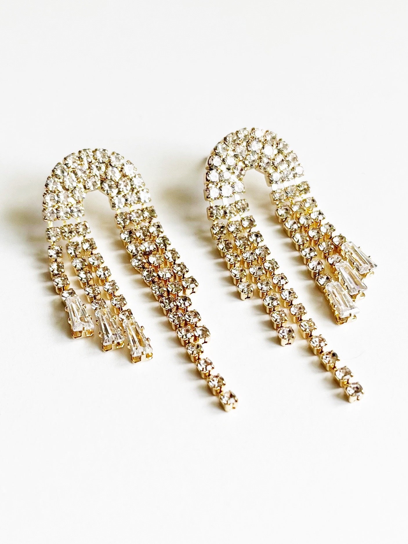 gold statement earrings with crystals