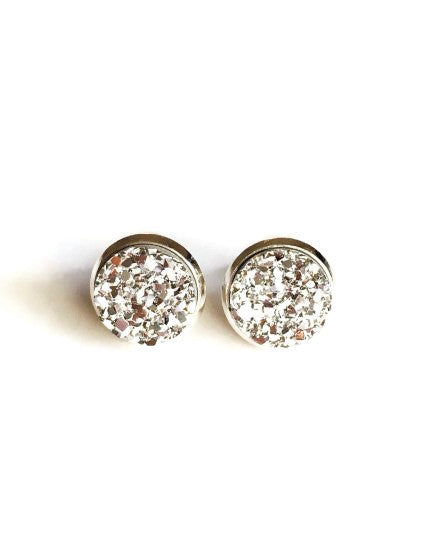 Silver resin druzy stone stud setting is set in a yellow gold color setting. 