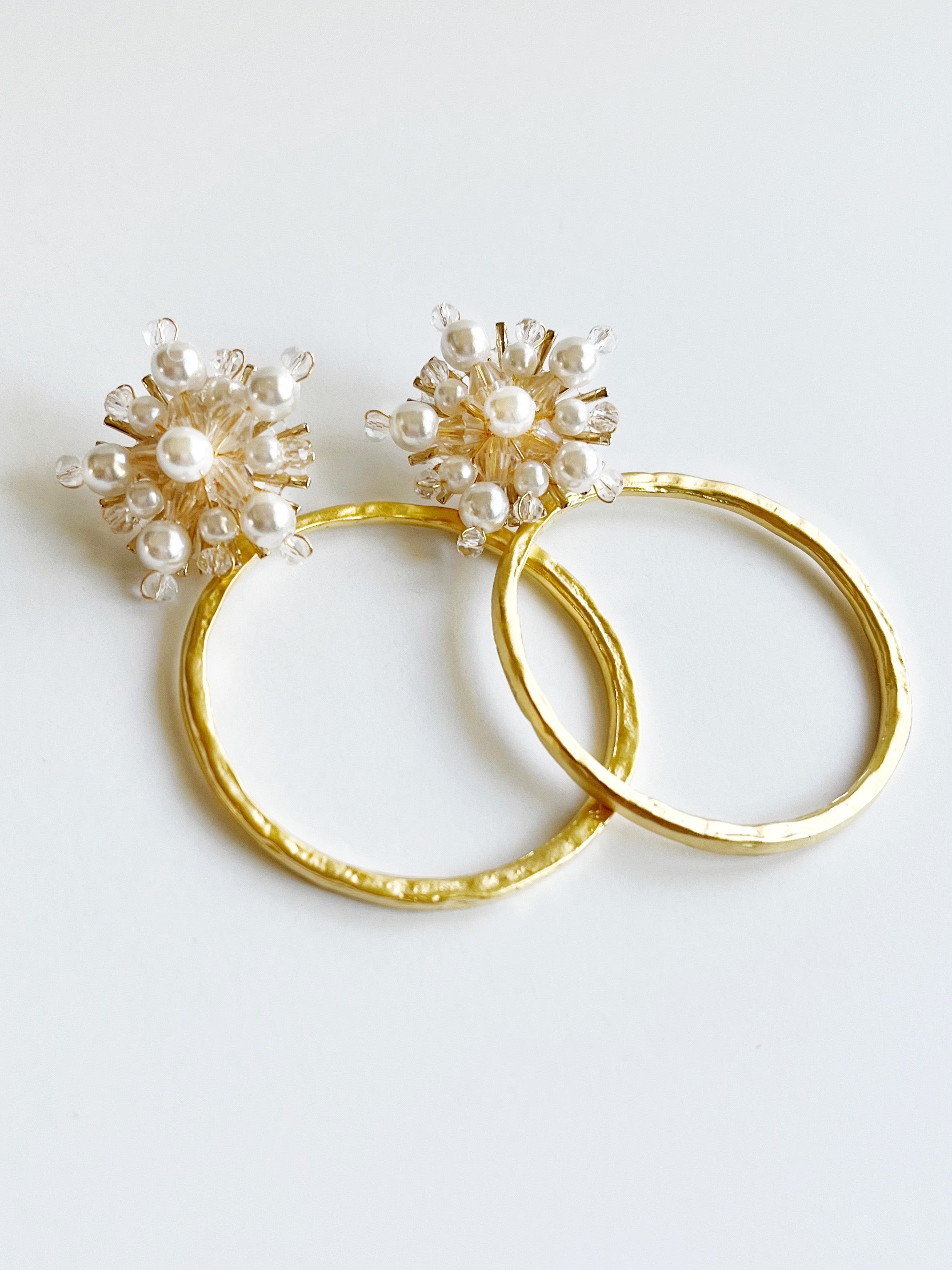 yellow gold hoop statement earrings with crystal and pearl stud